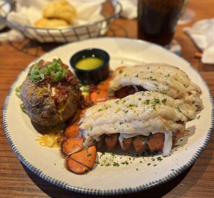 Twin Maine Lobster Tails with a loaded baked potato. Lobster 4/5, Fully Loaded Potato 3/5 (very small potato)