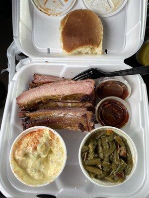 1/2 pound Rib Plate with 2 sides of choice and a roll (I got potato salad, green beans w/bacon)..Sauce on the side.