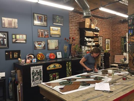 Owner, Valerie Spellman Batt working on a new stained glass piece