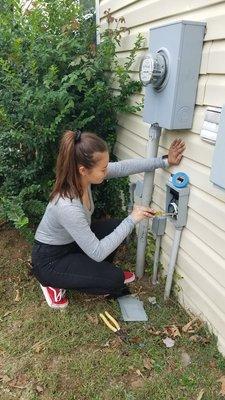 Happy Friday! Here's a little snapshot of one of our employees on a job. Who said ladies can't be electricians too?