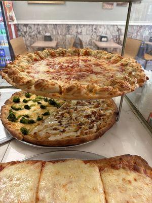 Fresh garlic knots pie,chicken bacon ranch slices and broccoli cheddar cheese slices