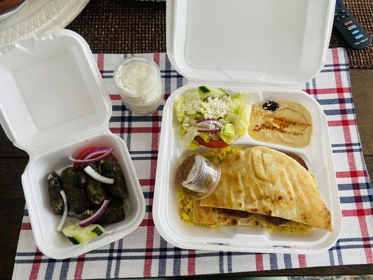 Flaffel plate and half dolma. Came with three sauce sides which was very tasty