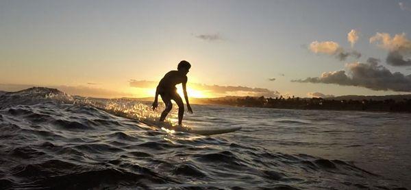 Surfing At Poipu Beach