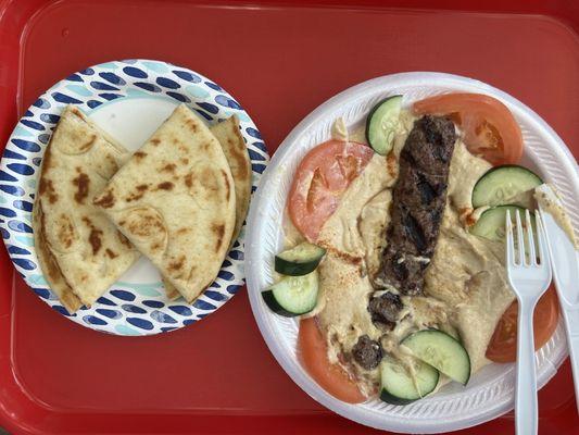 Hummus, kefta kabob, tomato, cucumber, and pita bread