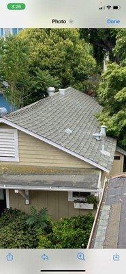 Note how the roof is sagging because the weight of the four layers cracked some of the rafters. All were replaced and it's no longer sagging