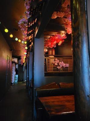 Glowing booths with dimmed light.