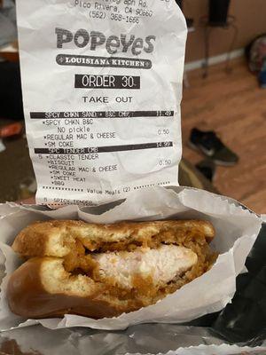 Bacon and cheese Spicy chicken sandwich with no bacon and no cheese and receipt showing that's what I paid