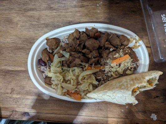 Brown stew chicken, rice & peas, cabbage, and a veg pattie