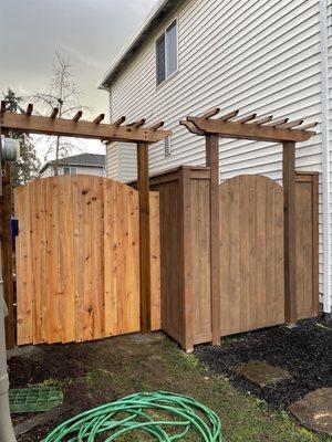 Ricks matched a new gate to the gate he did for our neighbor last year.