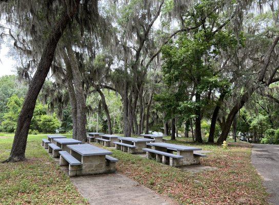 Tables available at Trail Head; parking lot area