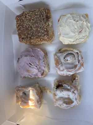 Sticky bun with nuts, Mini Huckleberry Roll, Mini Orange Roll and extra small cinnamon roll.