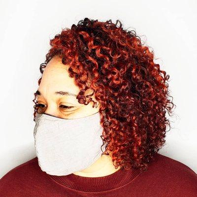 Red highlights on curly hair