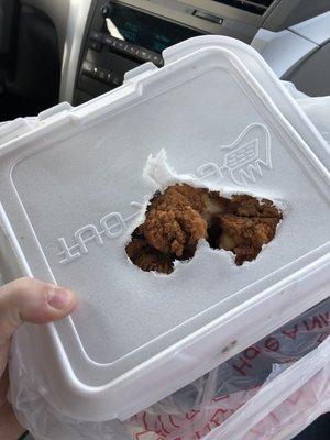 Chicken so hot it burned through the tray and halfway through the one on top of it