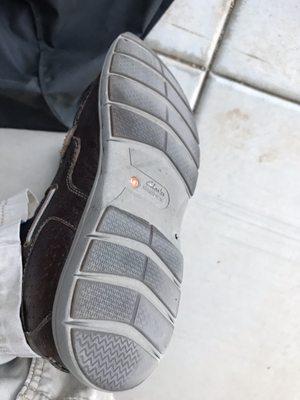 Can't see where the loose portion of the sole was on this shoe? That's because Moses Shoe Repair did a great job.