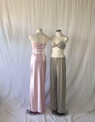 Pretty girl satin corset top paired with pretty girl satin maxi skirt and behind the sun bra top paired with behind the sun wide leg pants.