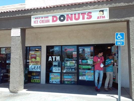 The Hole in One storefront.