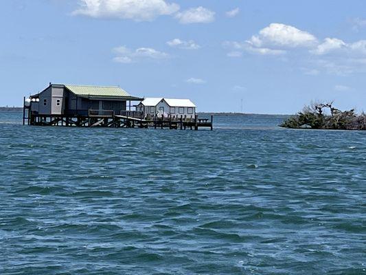 Fishing shacks off Pine Island,