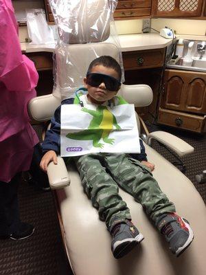 My son getting ready for his teeth to be cleaned