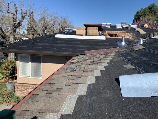 Complicated part of the roof was completed by the father and son team.