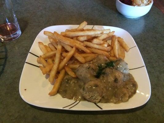 Meatballs with mushroom sauce and fries