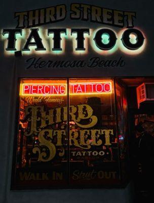 Front window of 3rd Street Tattoo