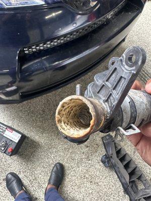 coolant filler neck filled with junk. Stop leak is not your friend long time.