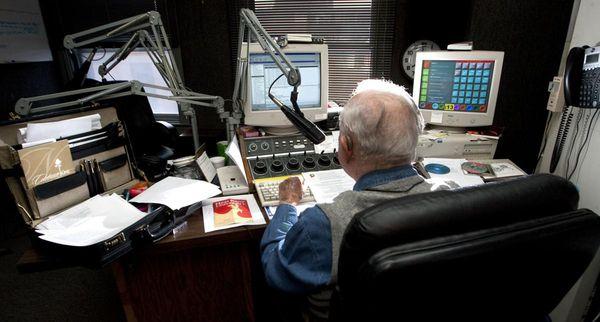 Max Meeks in the WMFR studio towards the end of his legendary career. Photo from the Greensboro News & Record.