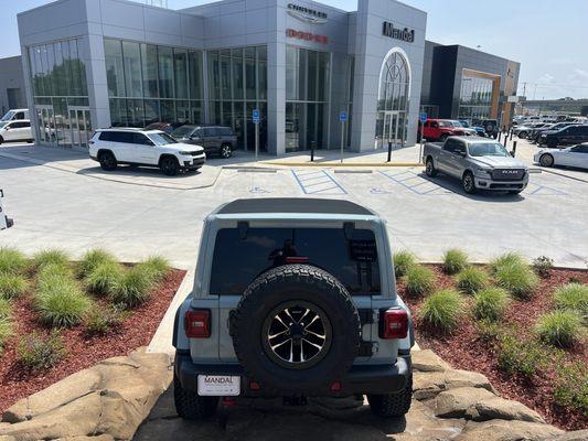 My new Rubicon X in front of the dealership