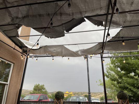 Bummed the tarp gave way but there's still room elsewhere on the outdoor patio.