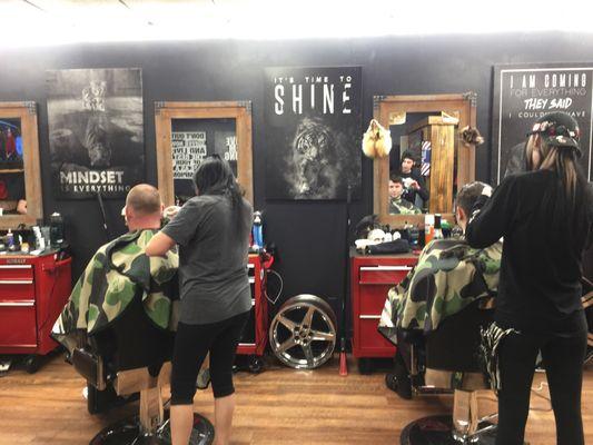 Some guys getting haircuts for the day