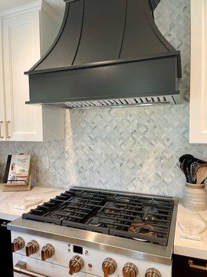 Backsplash up behind hood to ceiling