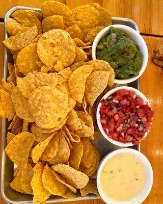 Bottomless chips, guac, salsa, queso