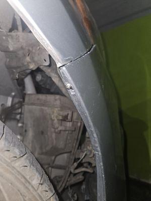 Bumper was connected to bodywork with a screw!