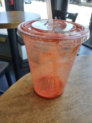 This is a picture of my empty "ginger beet" cup before i walk back across the street to get another one!