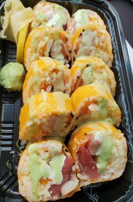 Tiger Roll wrapped in soy paper. Pretty yummy, and has a little crunch to it with the tempura chips inside the roll.