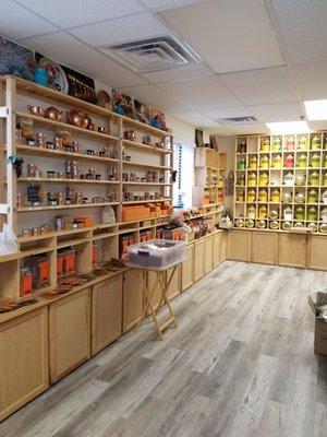 Tea in the back, spices on the left wall