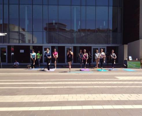 Outdoor yoga at Fenton Street Market.