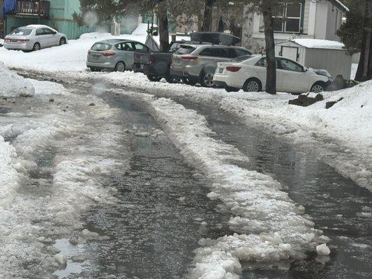 Our 100 foot pond that appears in the middle of the road every time the snow melts or it rains hard.