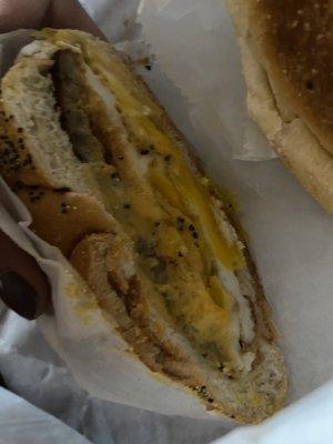 Sausage egg and cheese on a roll