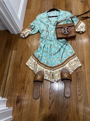 This whole outfit is from Stella Rose! Authentic Tory Burch sandals and cross body bag with a beautiful romper.