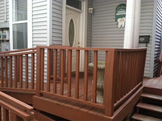 Entryway: stairs and handicap-accessible gradual incline ramp