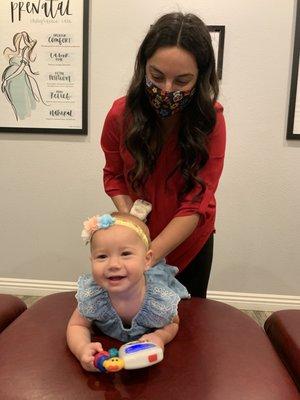 Dr. Sam with female infant patient.