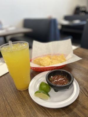 Chips and salsa and Pineapple Agua Fresca