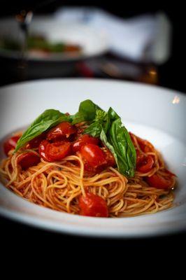 Capellini à La Checca | Angel hair, cherry tomatoes, basil, olive oil, garlic.