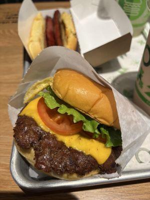 Shake Shack cheeseburger. Yum! Don't get confused with the cheeseburger menu option. Two different burgers.