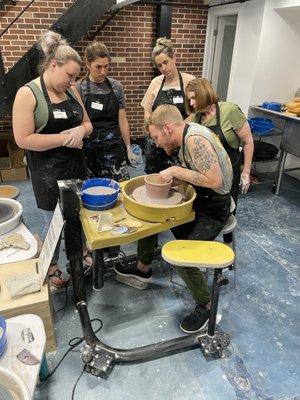 Adult art class on the pottery wheel