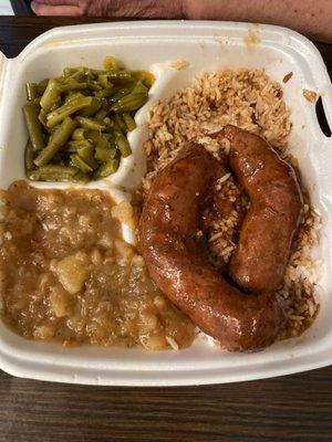 Fresh sausage, rice and gravy, green beans, smothered potatoes. All delicious