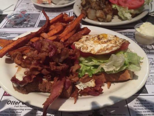 Food is awesome and great prices.  Their sweet potato fries are the bomb.  I had a BLT w a fried egg ,Yikes so big!!!