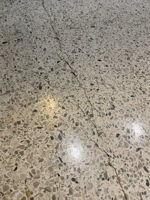 Extended our terrazzo floors and they have cracked.