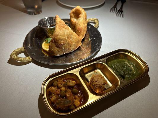 Crispy pastry stuffed with spiced potatoes and peas with a side of tamarind sauce.